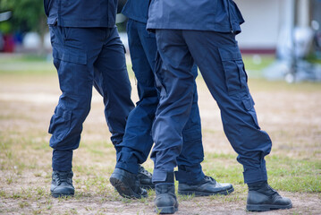 Fototapeta premium Riot police control the crowd practice and review on the grass field.