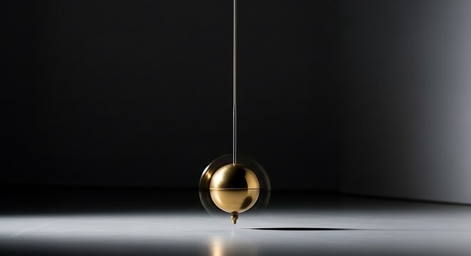 Golden pendulum swinging in a dark room representing time and motion