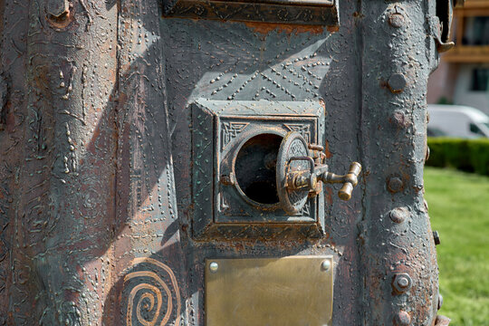Detail of the &laquo;Tree of Life&raquo; sculpture in Tbilisi Park Rike: stove door with handle