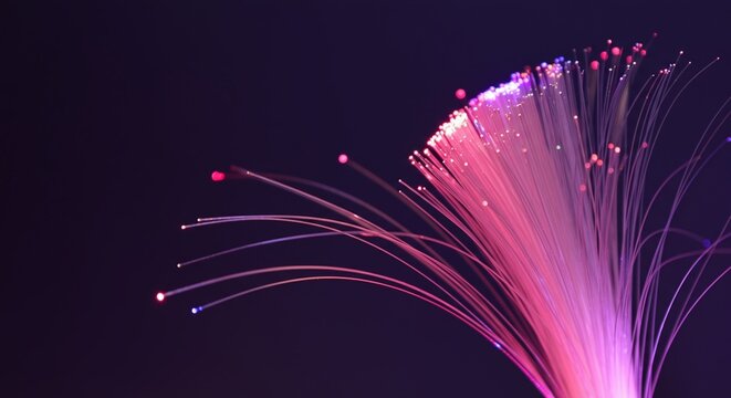 Dynamic Dutch angle shot of a thick bundle of fiber optic threads curving elegantly.