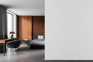 Fototapeta na wymiar Modern bedroom interior with wooden accents, patterned partition, workspace and wide empty wall mockup for poster or design template display in calm architecture. 3D Rendering