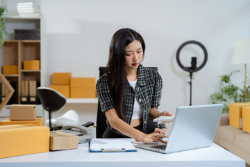 Woman start up online seller owner at workplace.