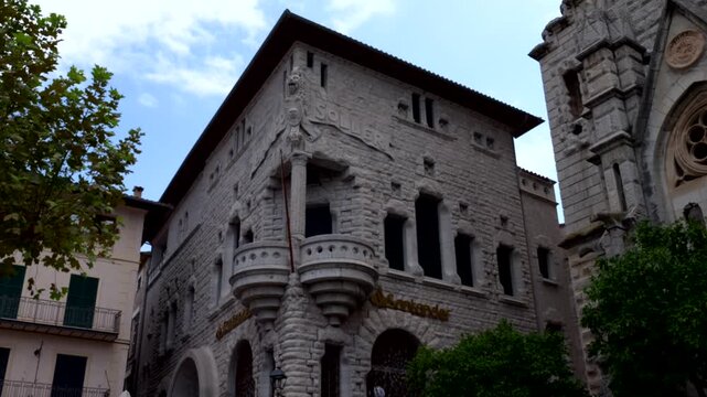 Mallorca, Spain. 07-28-2026. Soller Bank building at sunny day. Panning 4K