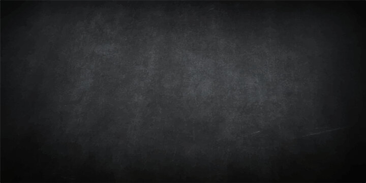 An empty vintage blackboard with chalk on a dark, dirty gray concrete wall texture backdrop