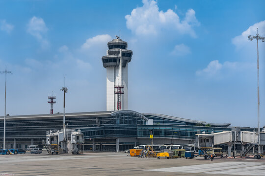 View of Tan Son Nhat airport traffic control tower in Ho Chi Minh City Saigon, Vietnam.