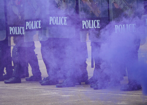 Riot police clashed with the protesters using smoke bombs