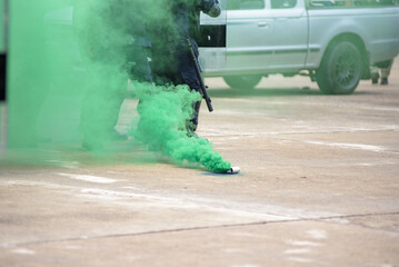 Fototapeta premium Riot police clashed with the protesters using smoke bombs
