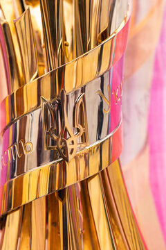 Close up of golden Ukrainian Football Cup trophy with traditional ornaments and trident