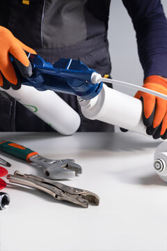  Technician repairing system of water filtration.  Home water filtration system.