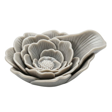 Gray stone flower carving with detailed petals