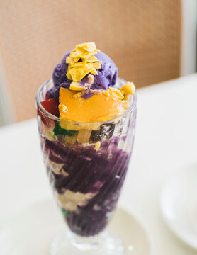 Traditional Filipino Halo-Halo Dessert with Ube Ice Cream and Leche Flan