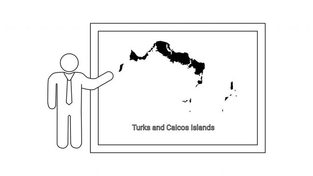 Teacher pointing at map of Turks and Caicos Islands on whiteboard.