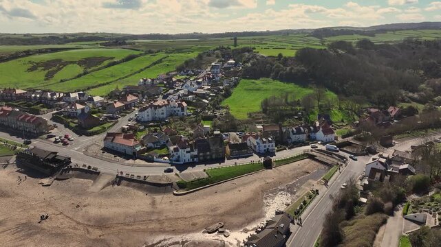 Aerial Video Sandsend Yorkshire UK.Sandsend is a small fishing village, near to Whitby in North Yorkshire, England. It forms part of the civil parish of Lythe. 