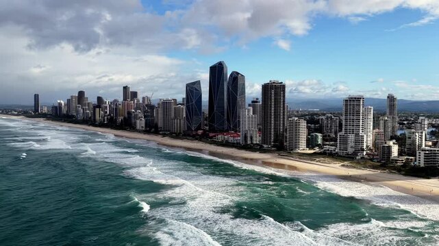 Fast aerial cityscape panorama of Gold Coast pacific waterfront Queensland, Australia