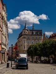 Fototapeta premium 2025-07-20; Historic tenement house and street view in Swidnica Poland.