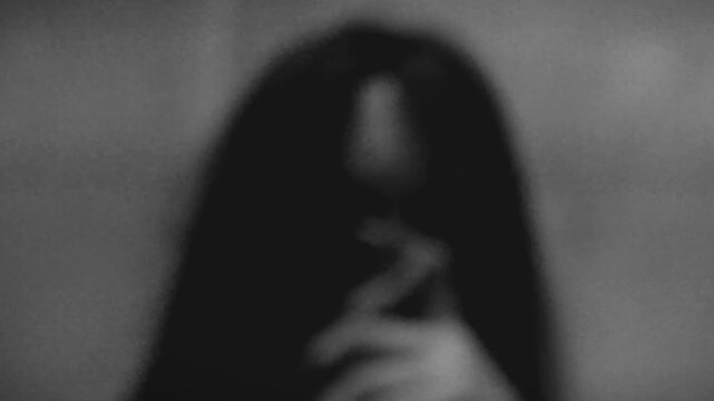 A Man Depressed in a Dark Room with Demonic Possession Gestures with Glitch Effects and Chaotic Movements