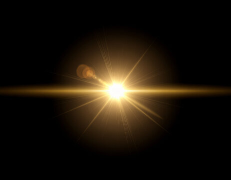 A brilliant burst of golden light radiates outwards against a stark black background, creating a mesmerizing visual effect of energy and illumination.