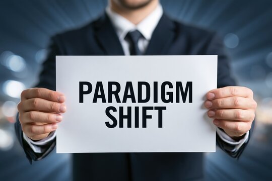 Businessman Holding a Sign Announcing a Paradigm Shift