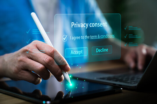 Digital privacy consent concept with user accepting terms and conditions on tablet interface representing data protection cybersecurity compliance and personal information security management