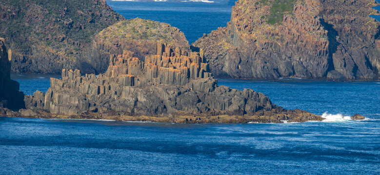 Lichen-covered "organ pipes", dolerite rock formations south of South Bruny Lighthouse, Bruny Island, Southeast Tasmania, Australia