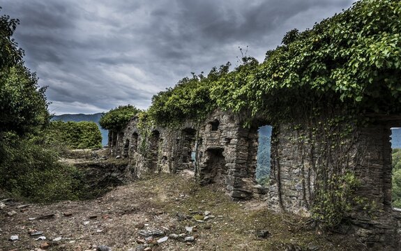 Ruins of the church of Santa Maria di Riscamone against dramatic sky, Valle di-Rostino, Haute-Corse, Corsica, France