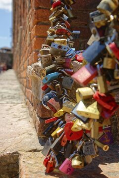 Padlocks as a sign of solidarity on the Ponte Scaligero bridge, Verona, Veneto, Italy