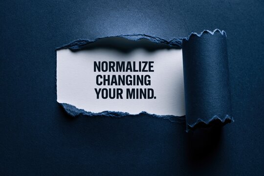 Normalize Changing Your Mind inspirational quote revealed under torn paper
