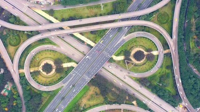 Aerial View of Busy Highway Interchange with Loop Ramps and Traffic