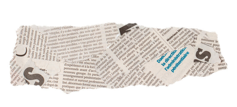 Torn newspaper clipping with French text
