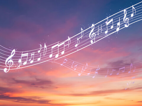 Whimsical background with treble clef and music notes at sunset