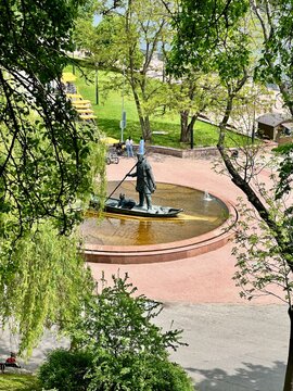 Belarus. Gomel. Bronze Boatman monument of first Gomel settler with lynx on Sozh river embankment