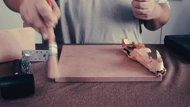 A man is doing repairs.