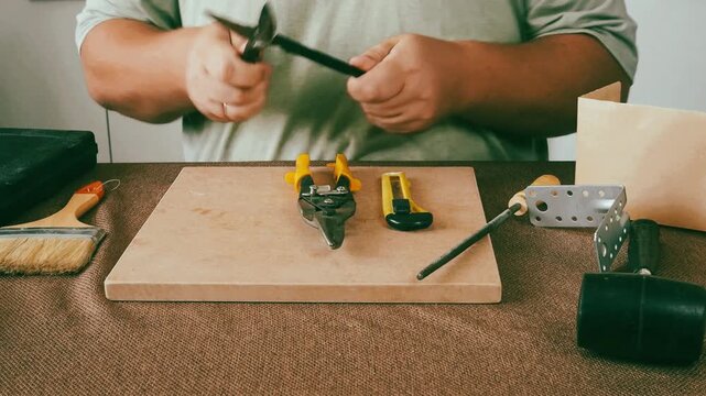 A man is doing repairs.