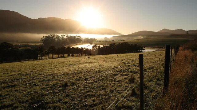 sunrise and fog over lake and farm land, Stanford, South
Africa