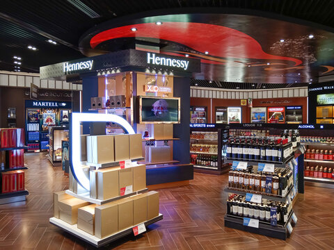 Phnom Penh, Cambodia - March 1, 2025: Interior of a retail store  selling a variety of alcohol, liquor, and tobacco products in the duty free shop at Phnom Penh International Airport in Cambodia.