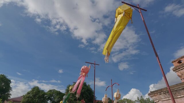 Floating lanterns, yellow and pink, Northern Thai art, Chiang Mai, Thailand. Lanterns with Lanna art patterns.