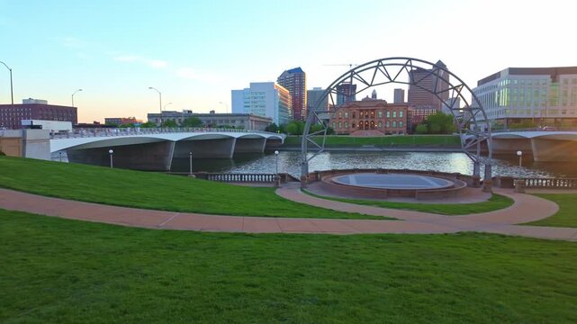 Golden sunset view of the Simon Estes Riverfront Amphitheater in downtown Des Moines Iowa