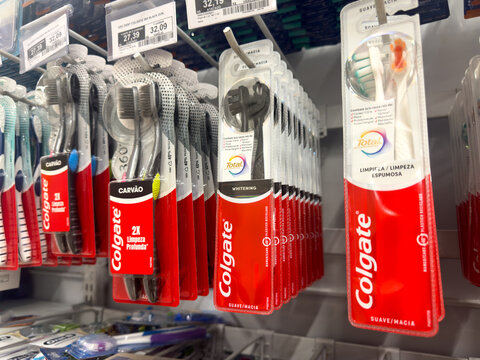 BELO HORIZONTE, MG, BRAZIL, MAY, 15, 2026 A store shelf stocked with various Colgate toothbrushes in their packaging