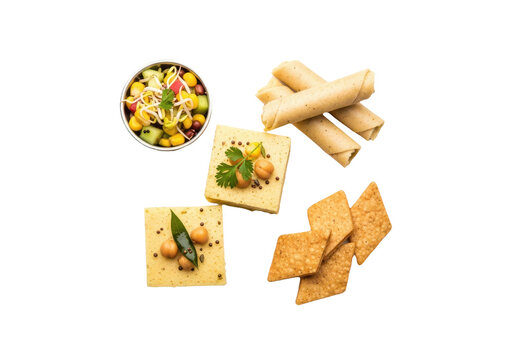 Assorted indian snacks including dhokla, khandvi, and diamondshaped savory crackers, isolated on transparent background