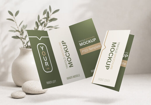Floating Trifold Brochure Mockup with Plant and Stones Background