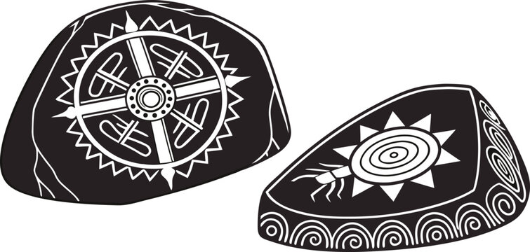 Two stylized black stones with ancient tribal symbols and geometric patterns