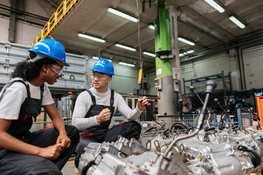 Teamwork during machinery inspection in industrial facility
