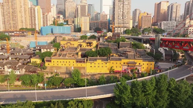 Wong Tai Sin Temple amid Hong Kong city skyline in Wong Tai Sin Temple, Hong Kong