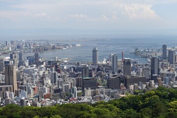 Obraz premium japan kobe hyogo Harbor city overlooking bay with skyline buildings aerial view