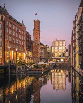 Sunset at Bleichenfleet canal and old post in Hamburg Germany