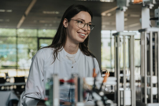 Scientist in laboratory using sorting machine and laboratory equipment