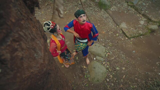 Overhead Shot of Traditional Couple Standing in Forest