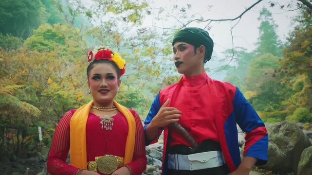 Proud Javanese Dancers Posing with Traditional Weapon