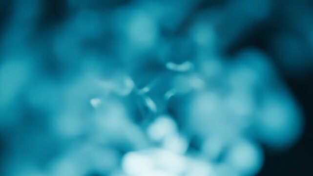 Abstract digital background with ethereal blue bokeh particles and soft light flares for modern creative technology presentations