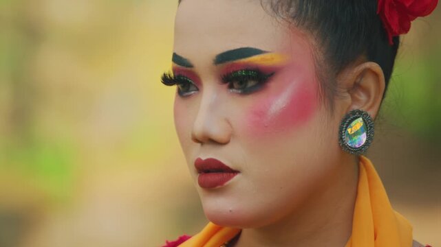 Melancholic Portrait of Traditional Dancer Looking Away